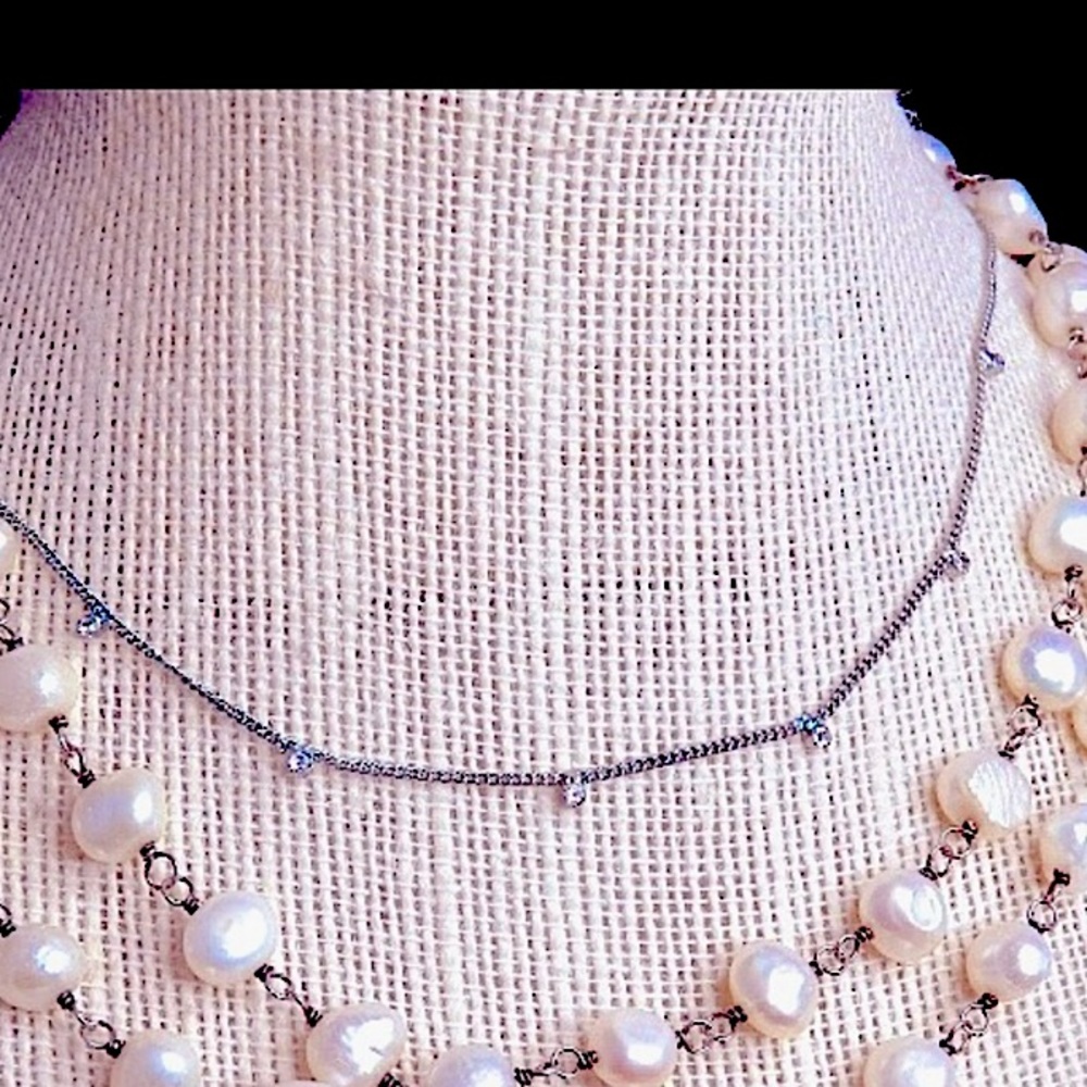 American Eagle silver and crystal chain. 16”.